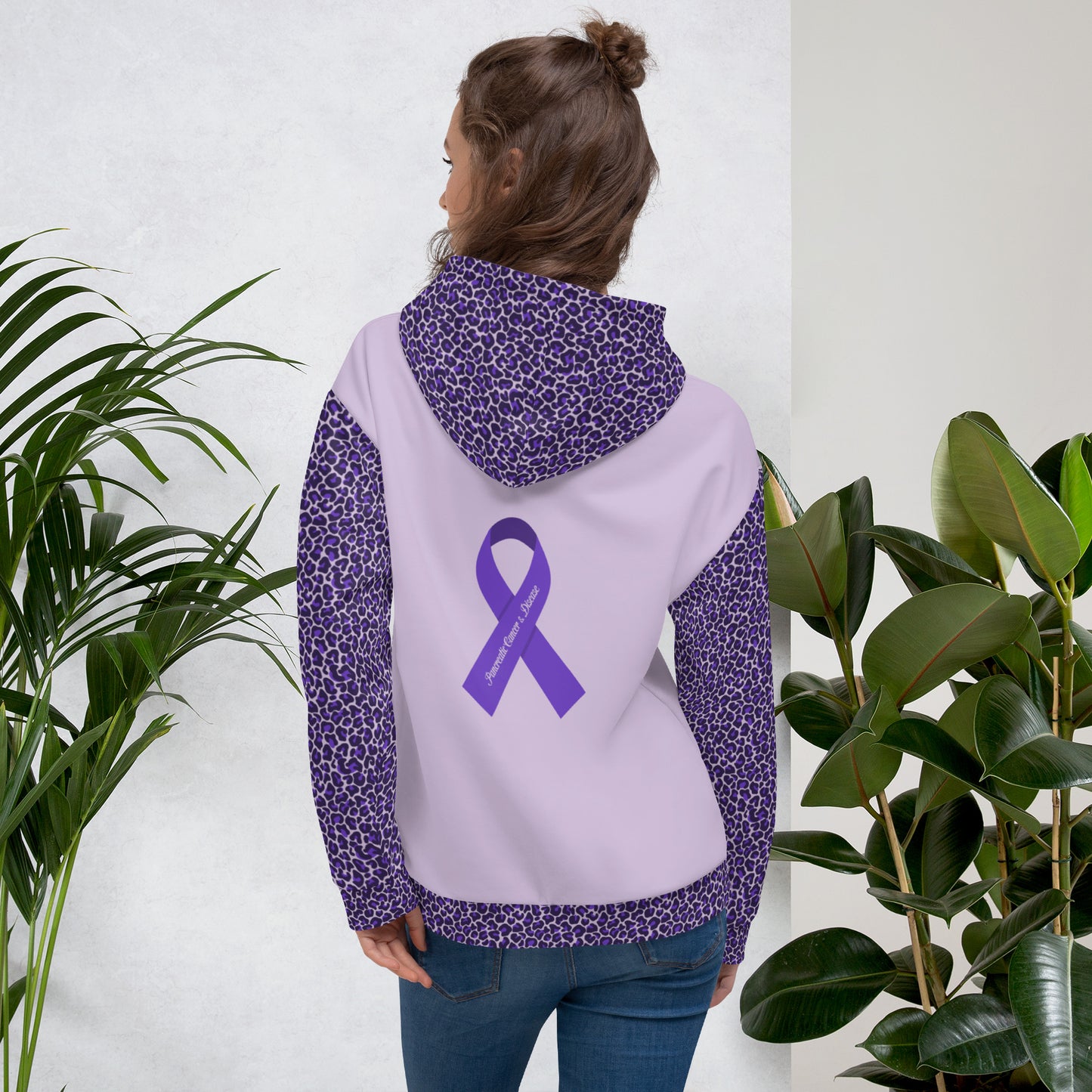 The back side of my Whipple Warrior hoodie has a purple ribbon on it that says "Pancreatic Cancer & Disease". The design features a fun purple leopard print on the sleeves, hood, and bottom fold. Help raise awareness for pancreatic cancer, diseases, and the Whipple Surgery.