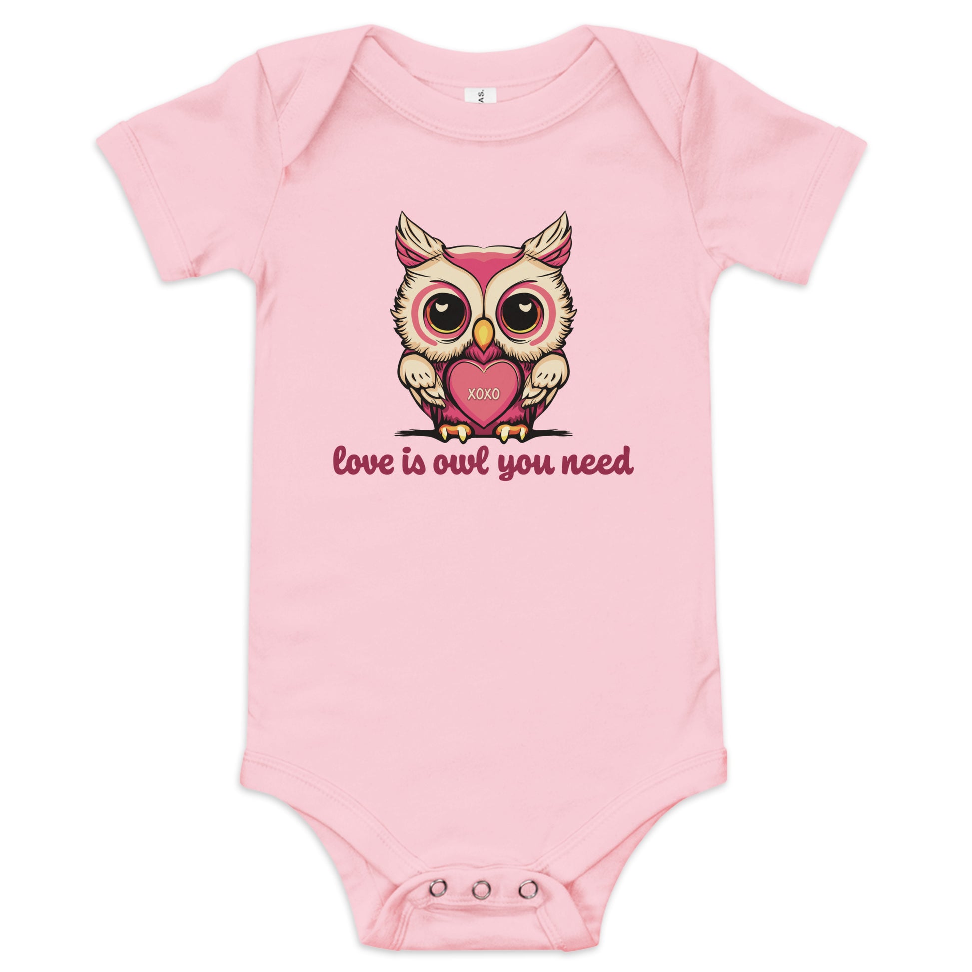 Pictured is a pink one piece bodysuit with short sleeves and 3 snaps for baby girls to wear for Valentine's Day. The cute graphic design       is a pink and beige colored owl holding a heart that says "xoxo". The words underneath the owl artwork say "love is owl you need". This       adorable infant clothing for girls comes in 4 colors, pink, grey, yellow, and white. Sizes available are 3-6 months, 6-12 months, and  12-18 months.