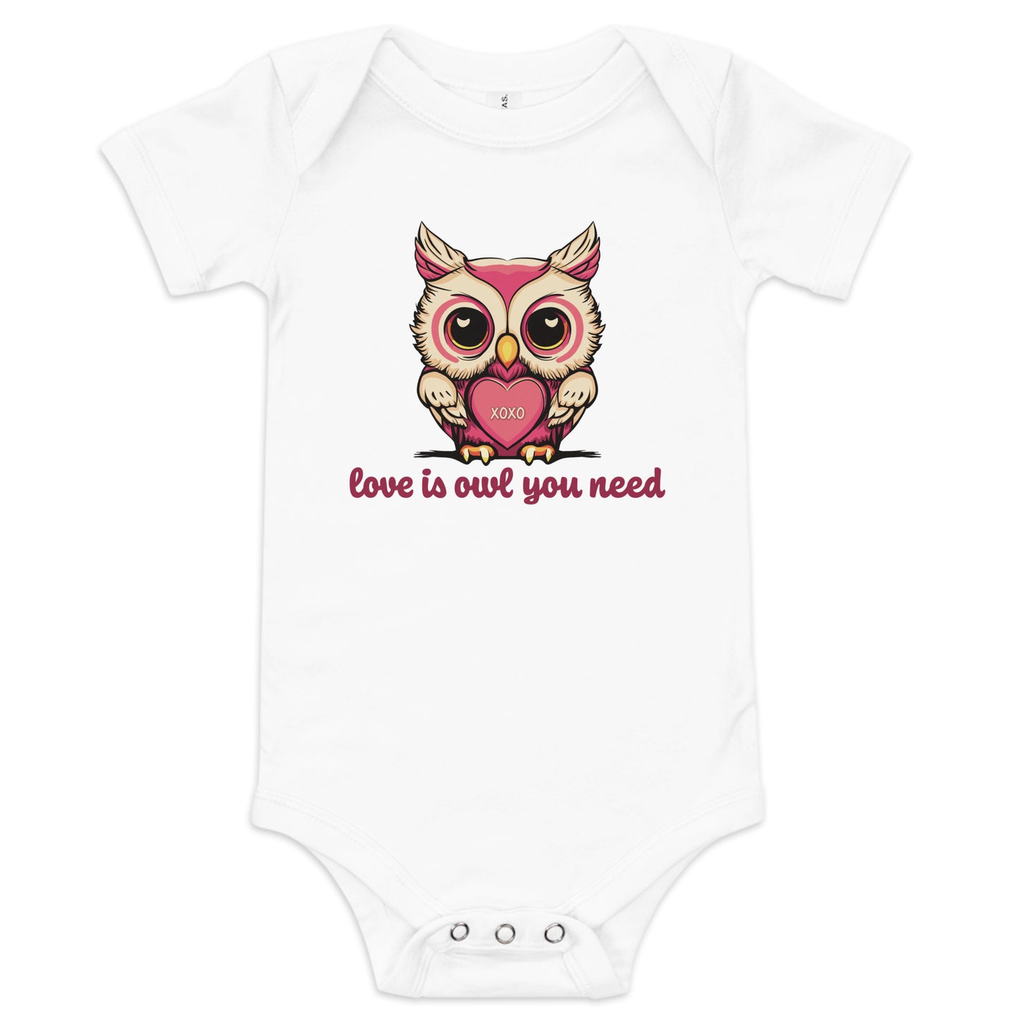 Pictured is a white one piece bodysuit with short sleeves and 3 snaps for baby girls to wear for Valentine's Day. The cute graphic design       is a pink and beige colored owl holding a heart that says "xoxo". The words underneath the owl artwork say "love is owl you need". This       adorable baby girl clothing comes in 4 colors, pink, grey, yellow, and white. Sizes available are 3-6 months, 6-12 months, and 12-18 months.